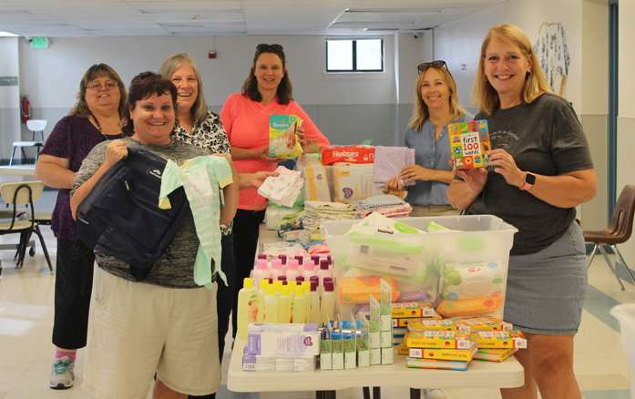 Canyon County Baby Bundles Canyon County Branch members assembling Baby Bundles