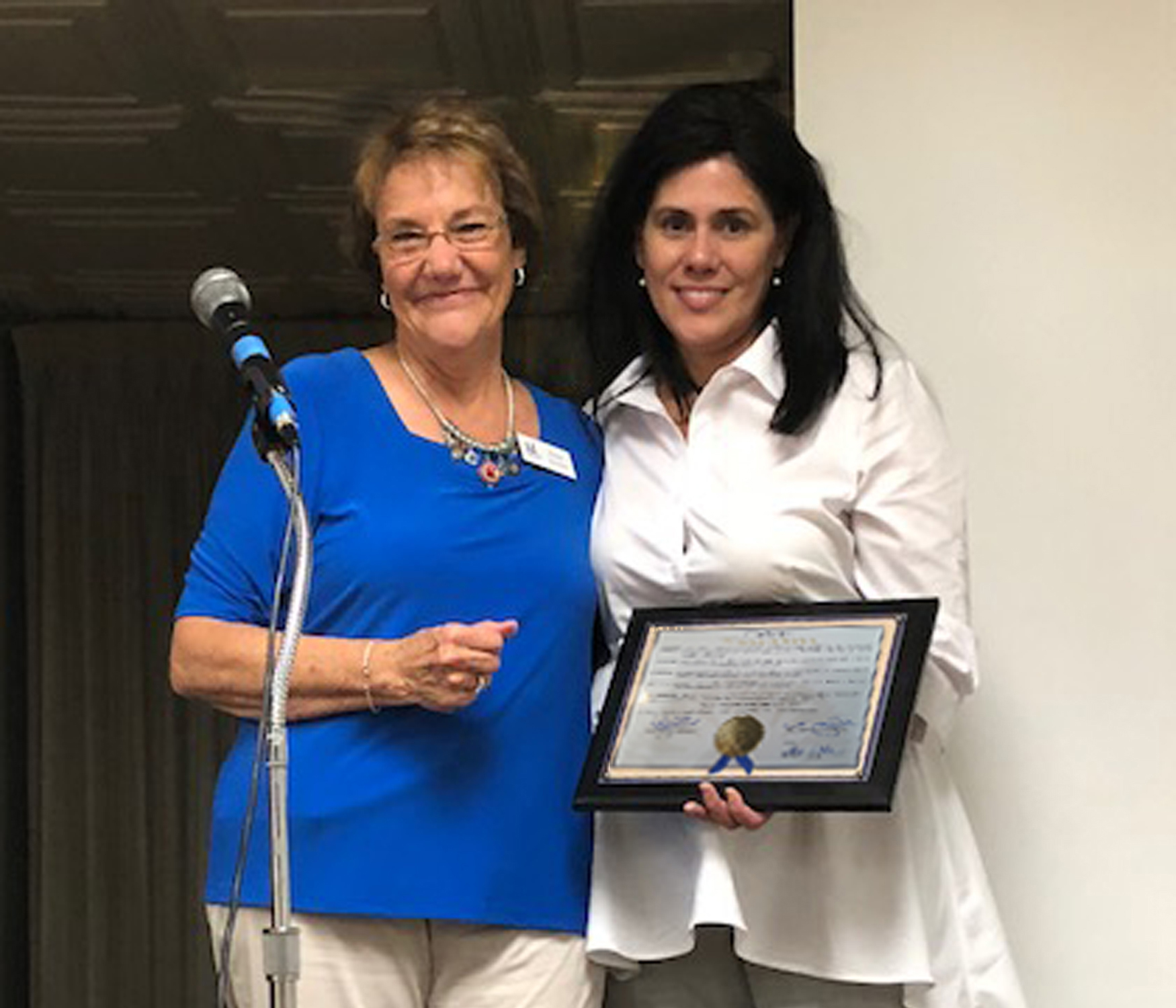 ALSJ President accepting San Jose award