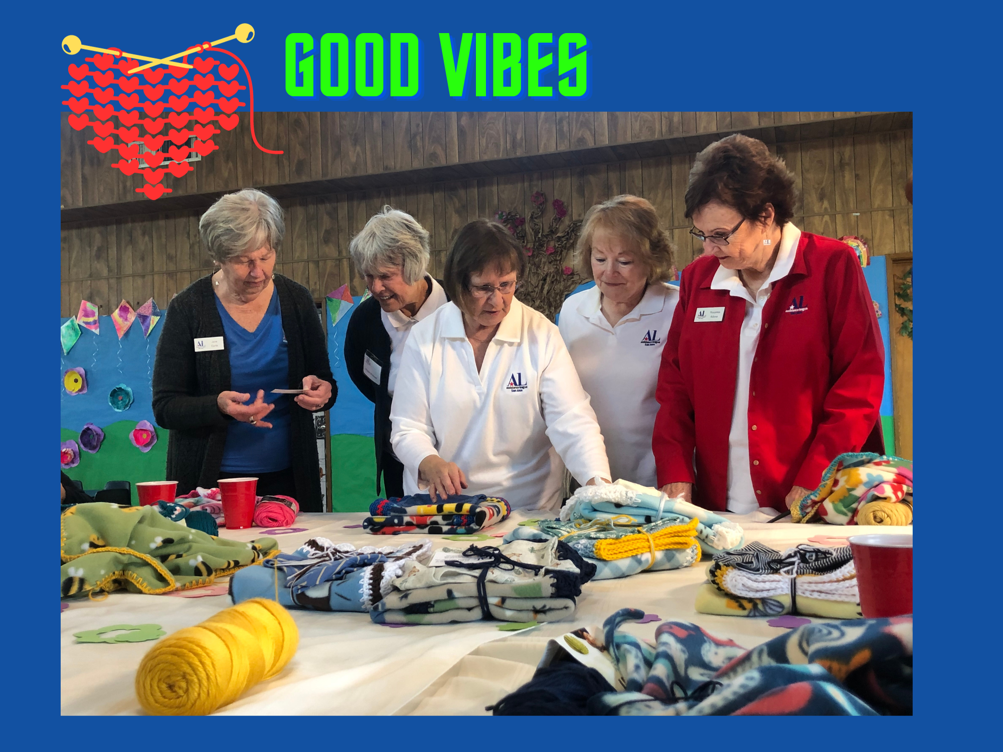 Caring Hands Volunteers Folding Blankets
