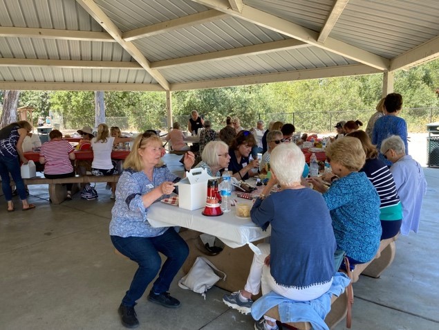 San Jose - Assistance League Splashes of Summer (001) wOMEN SITTING AT TABLE EATING LUNCH